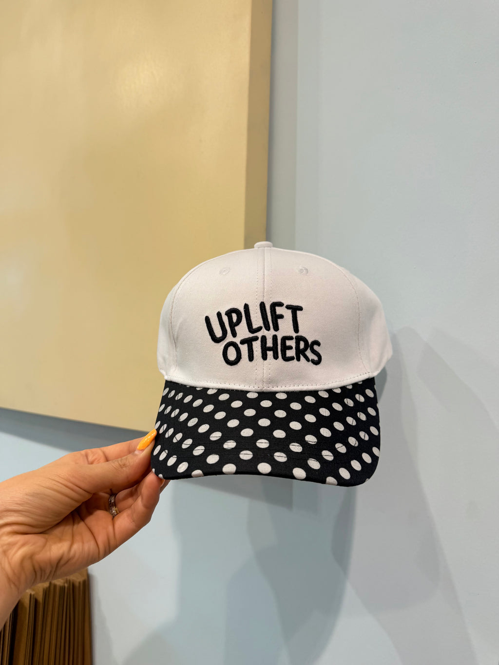 uplift others hat
