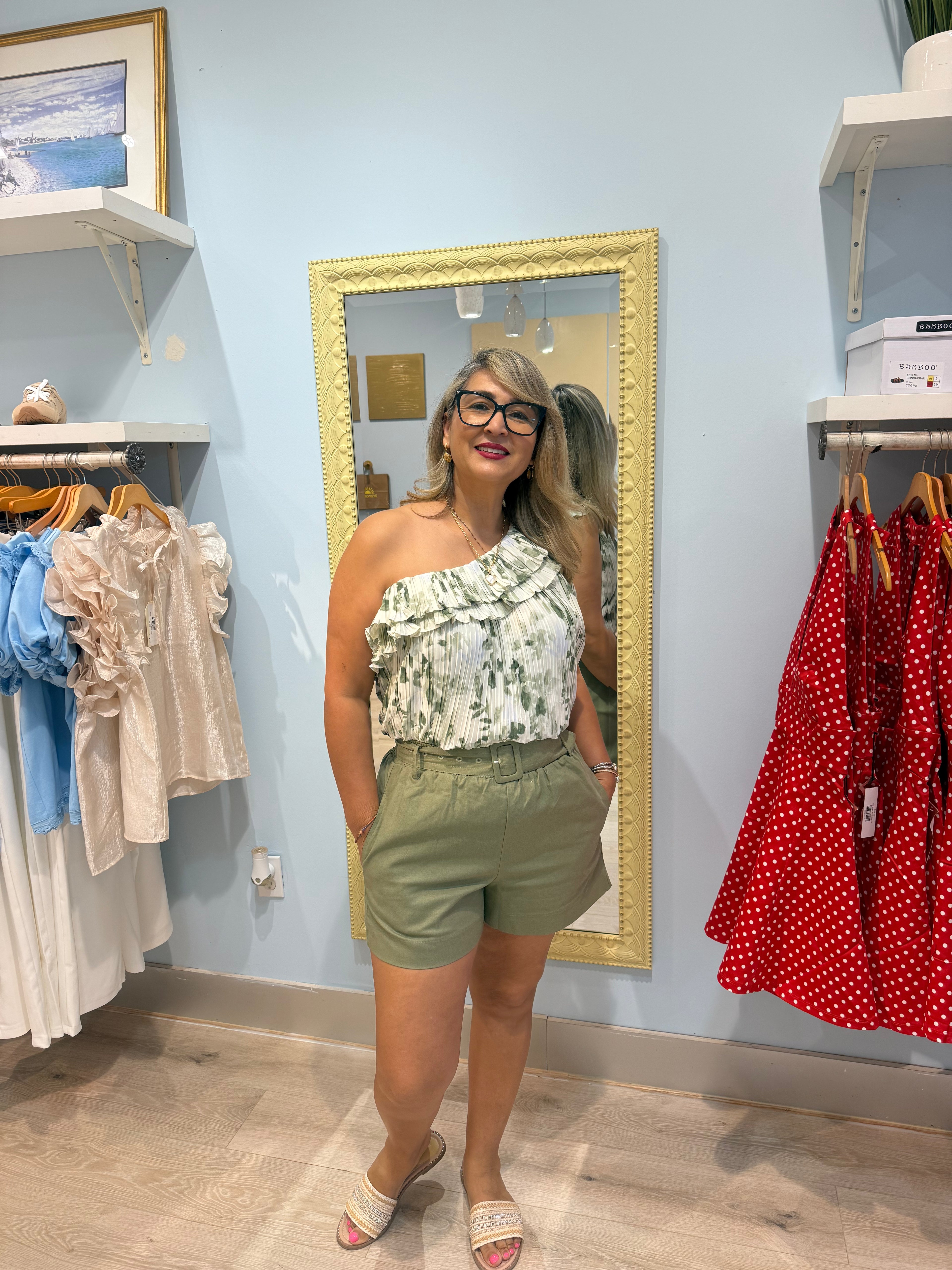 green shorts with matching belt