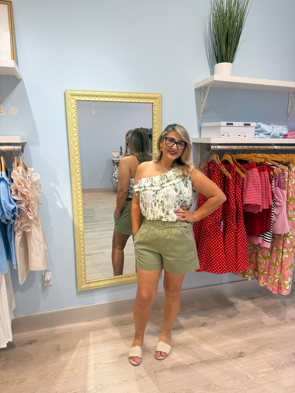 green shorts with matching belt