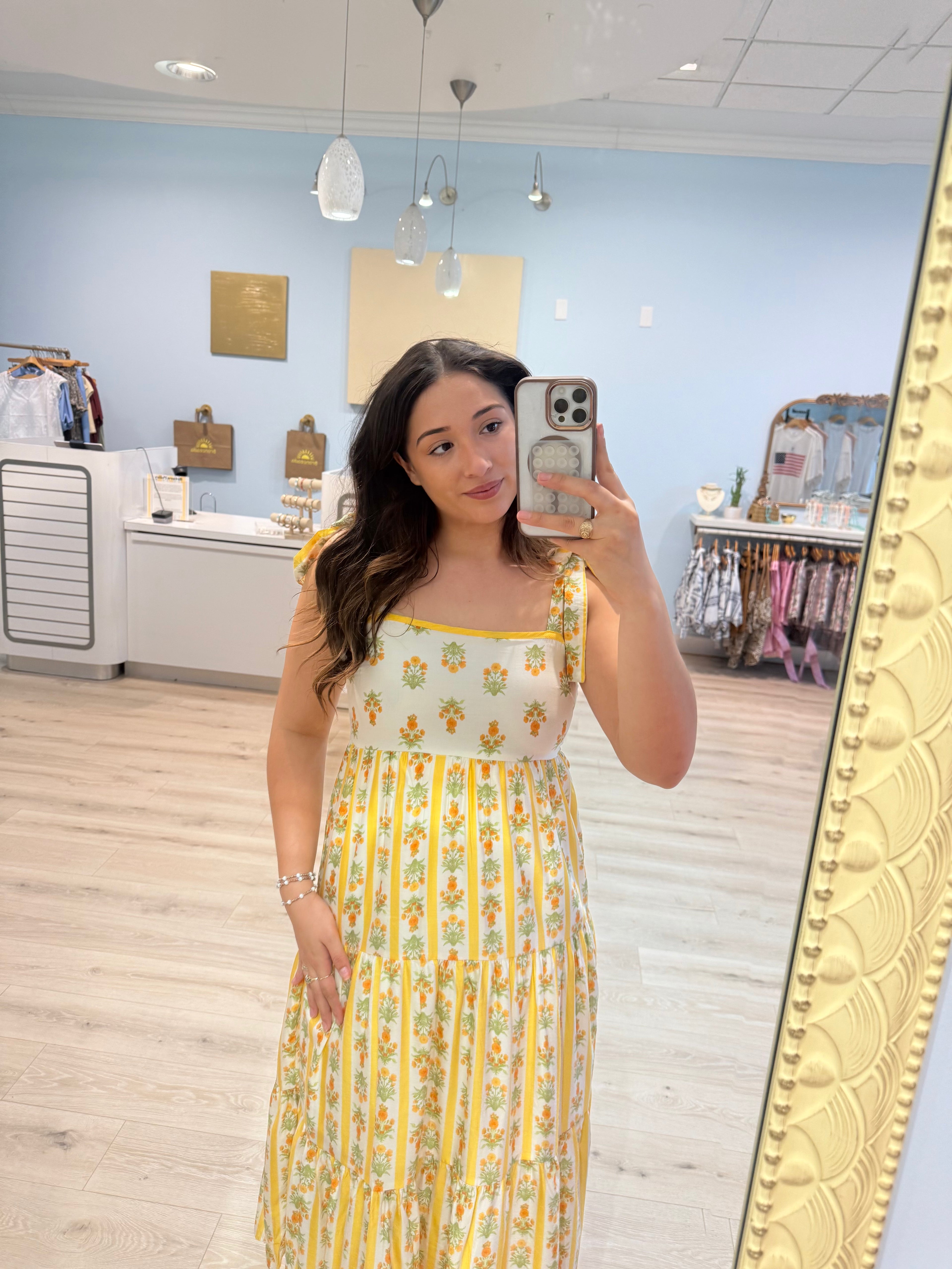 maxi dress with yellow trim and flowers