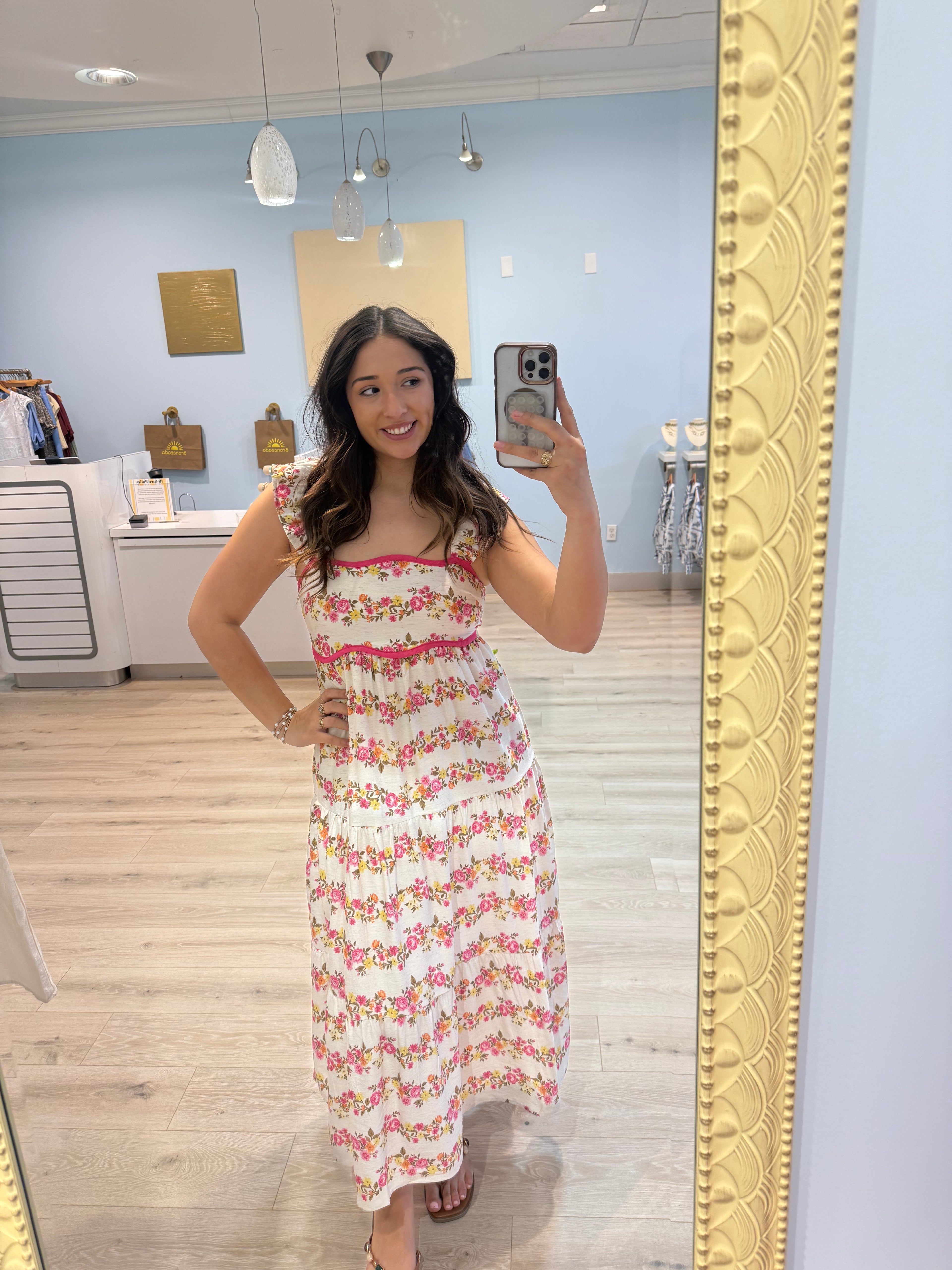 maxi dress with pink trim and florals