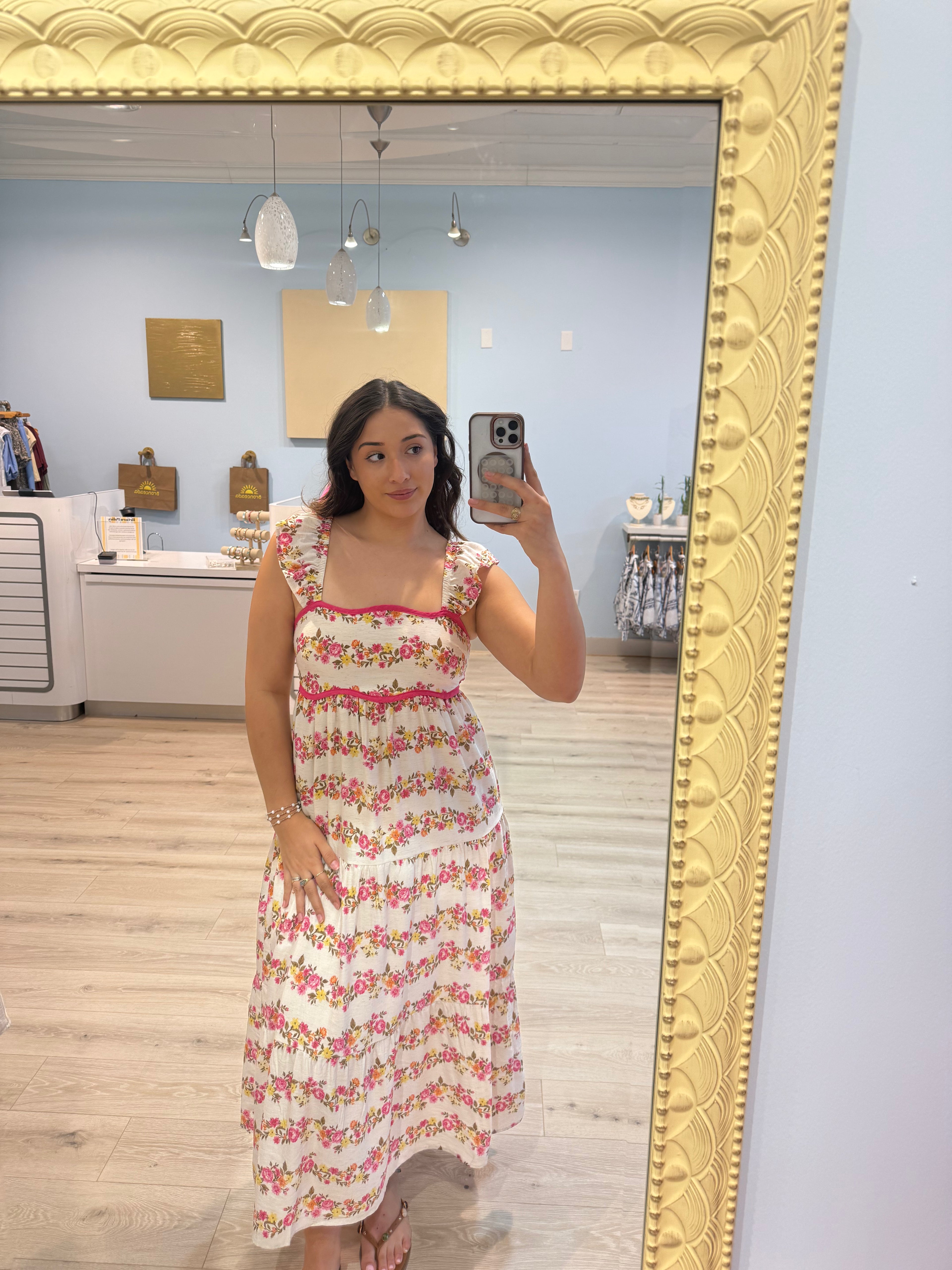 maxi dress with pink trim and florals