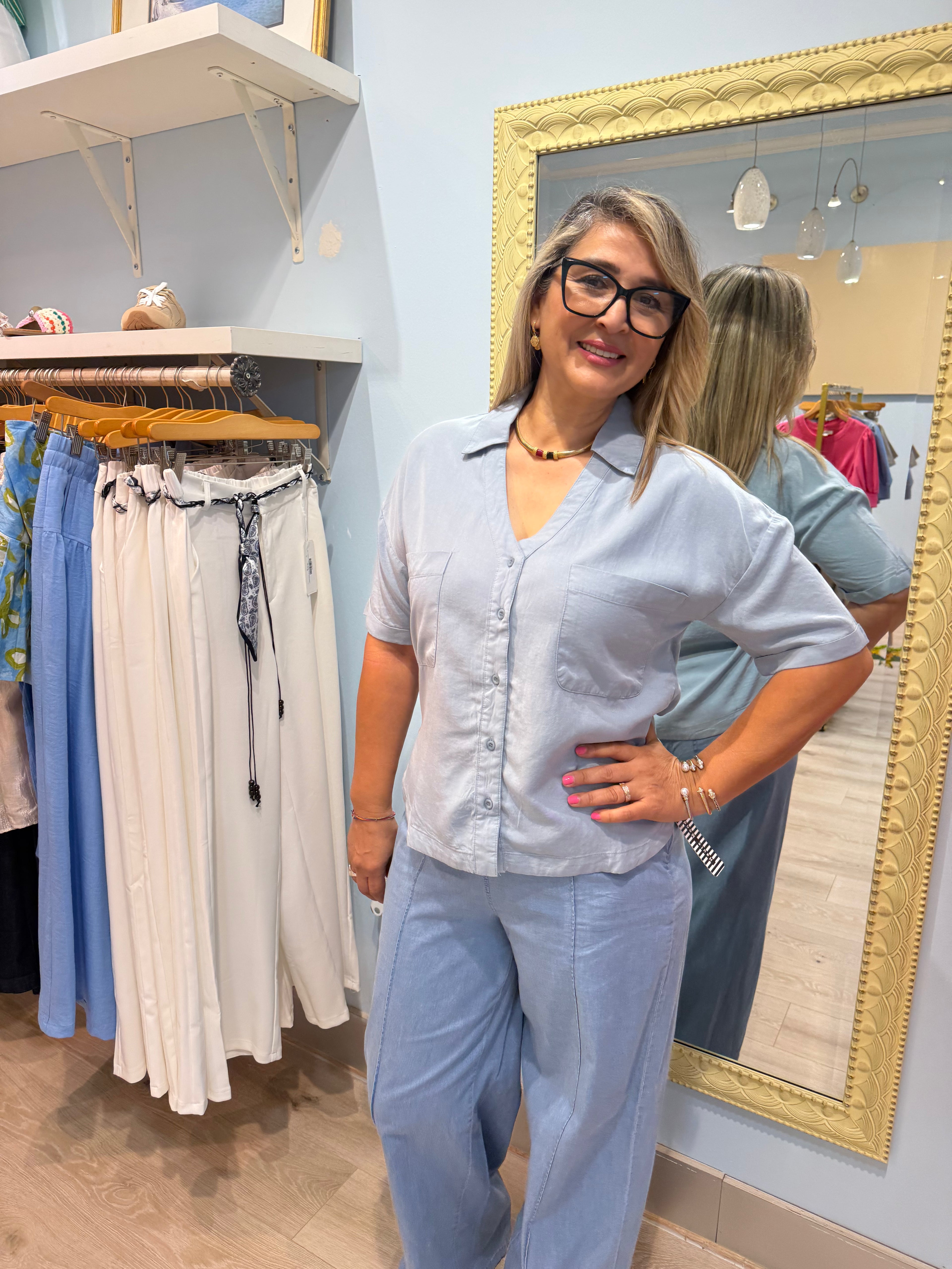 blue collared button up tee