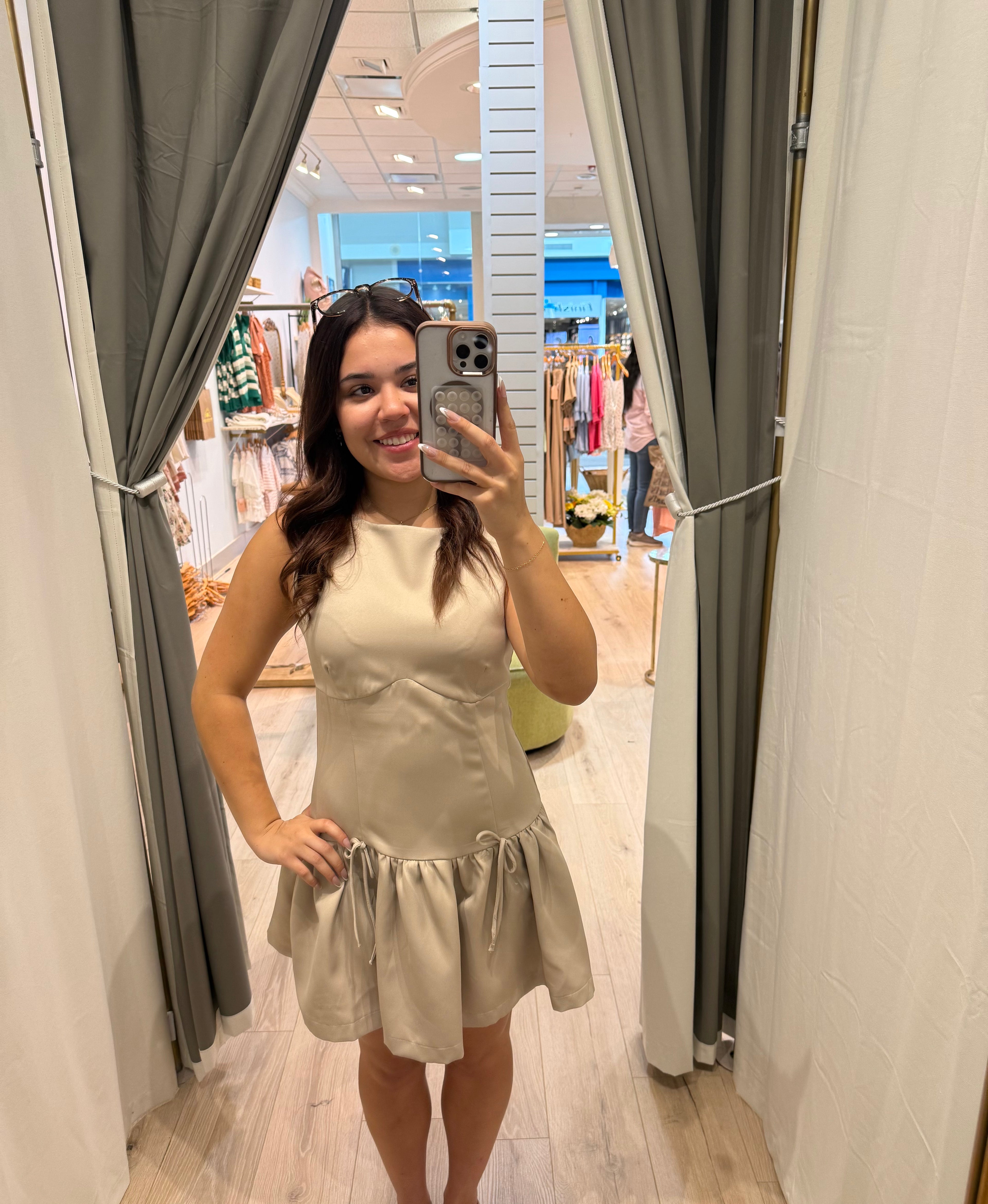 beige mini dress with bows