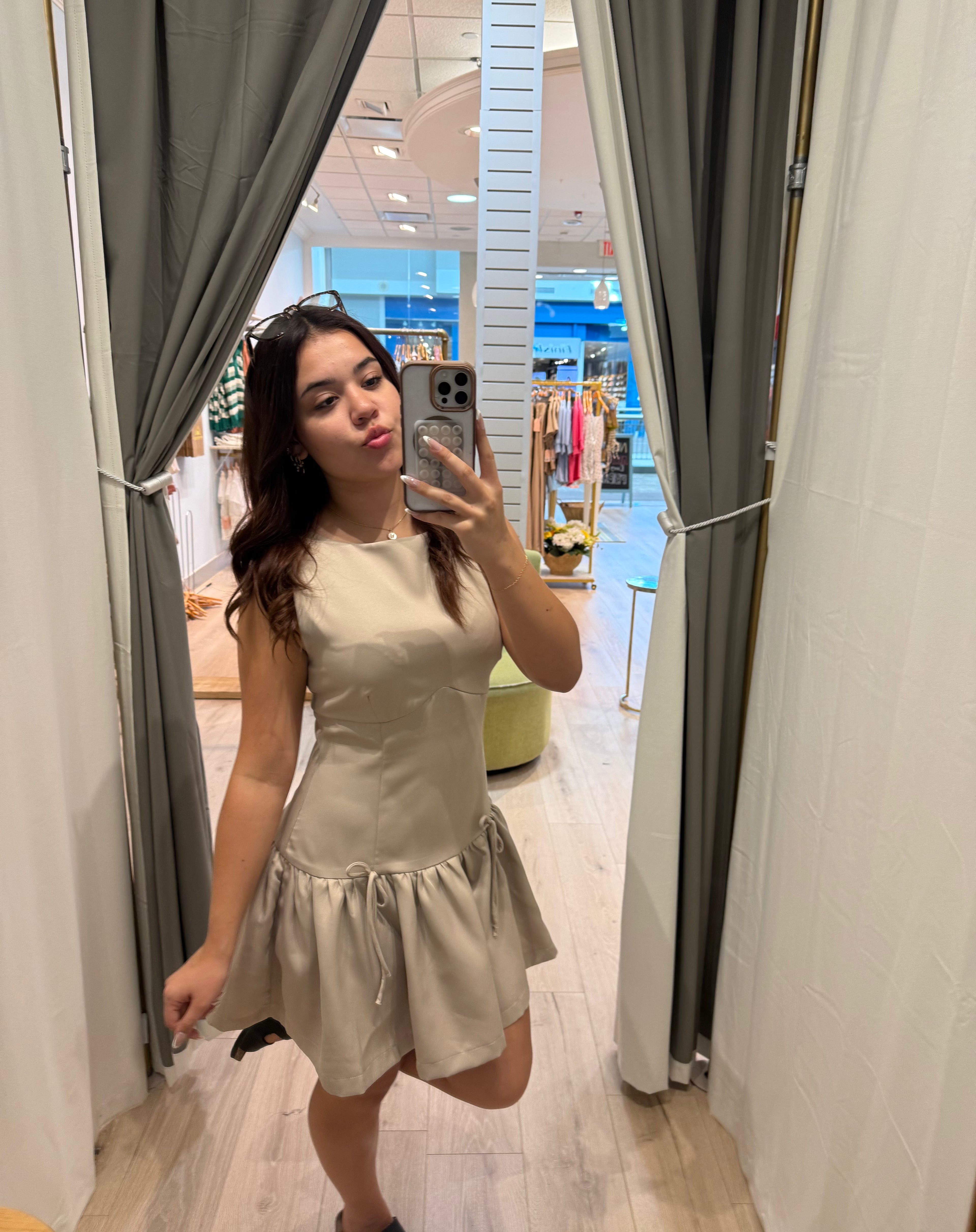 beige mini dress with bows