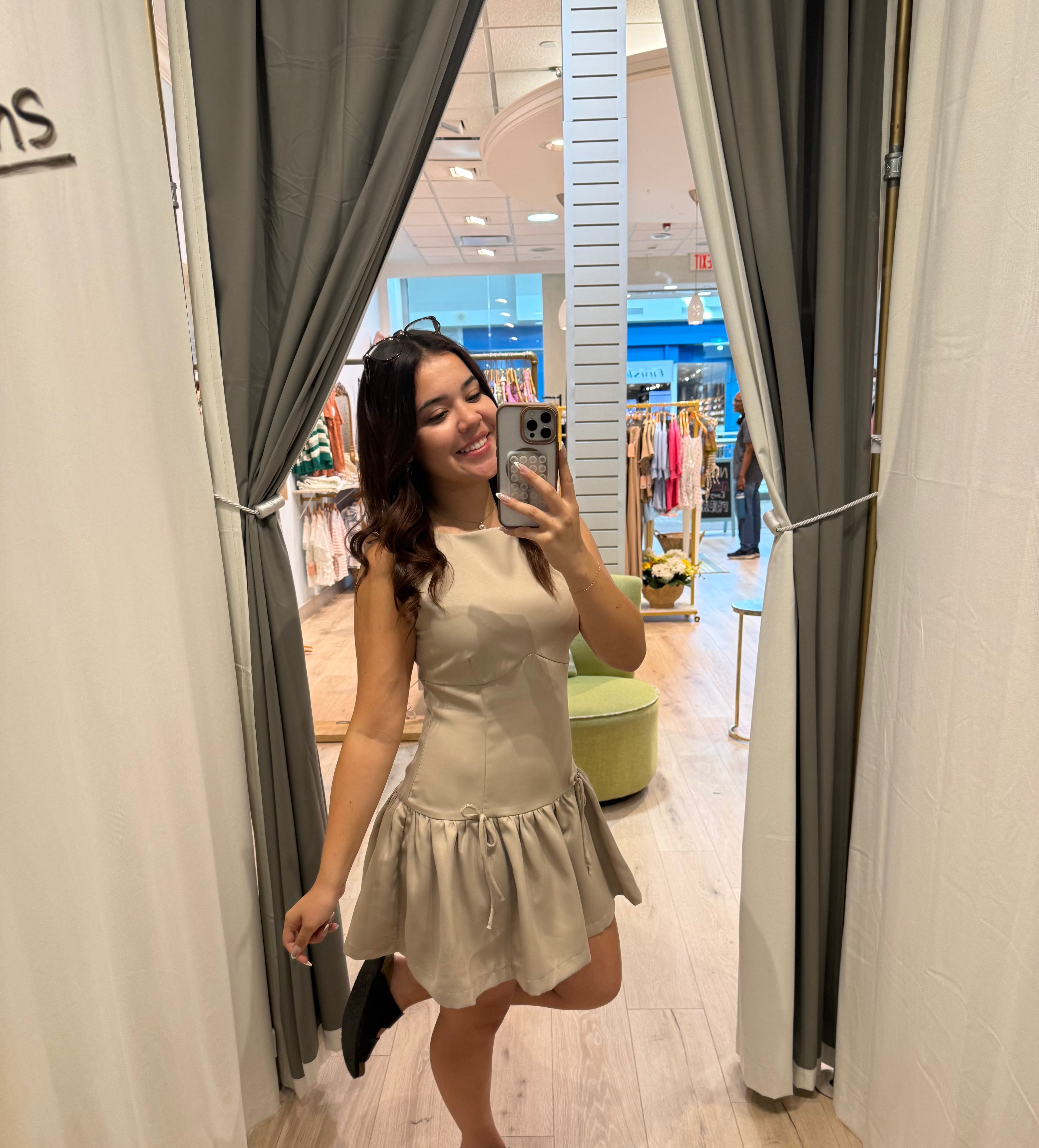 beige mini dress with bows