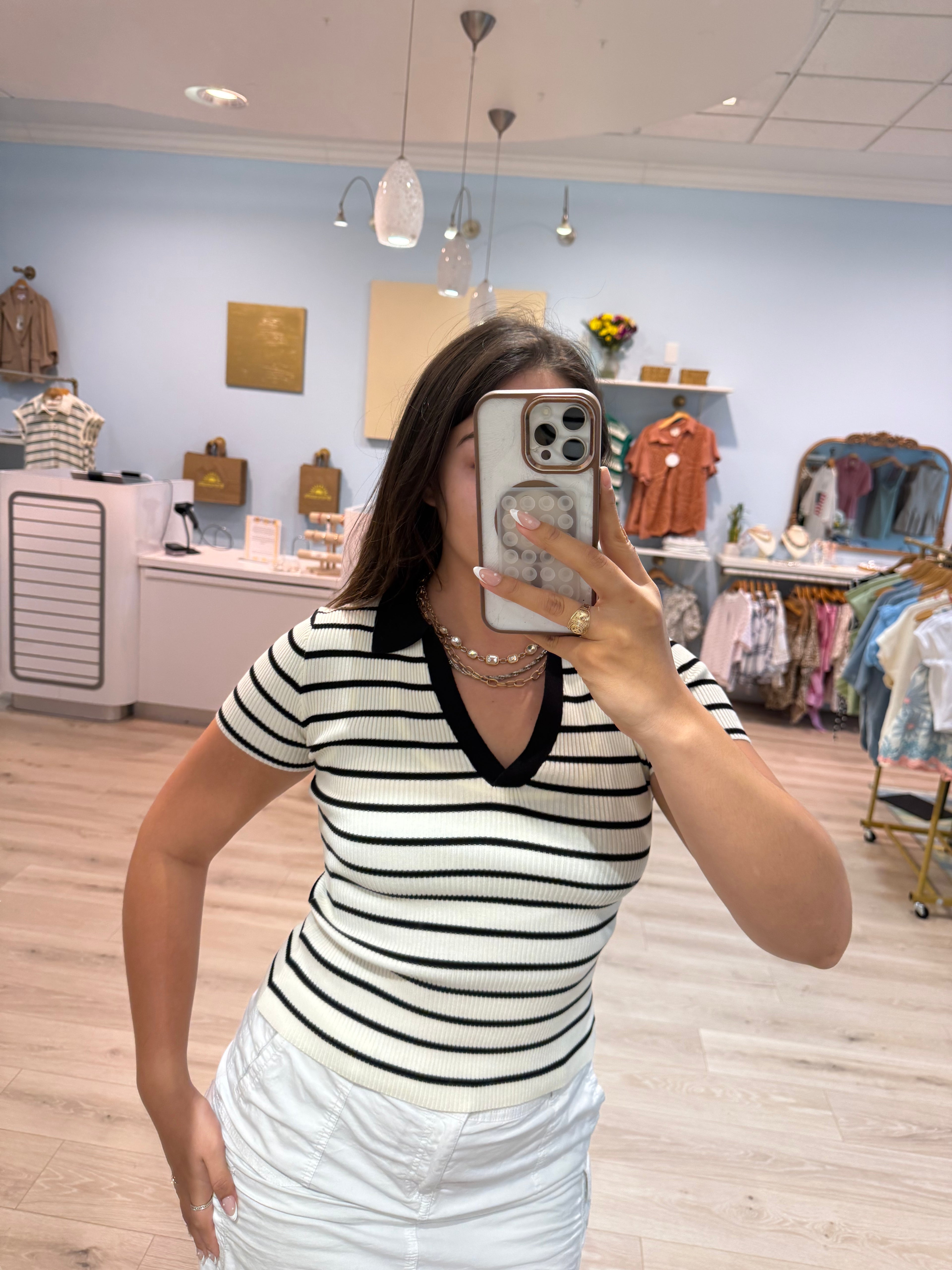 white and black collared tee